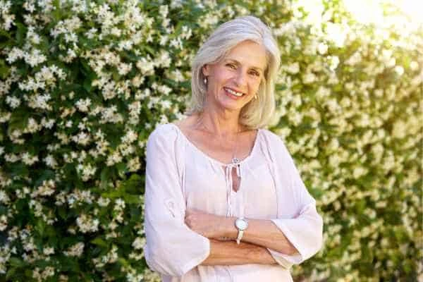 Older woman happy with urinary incontinence treatment Chandlers Green