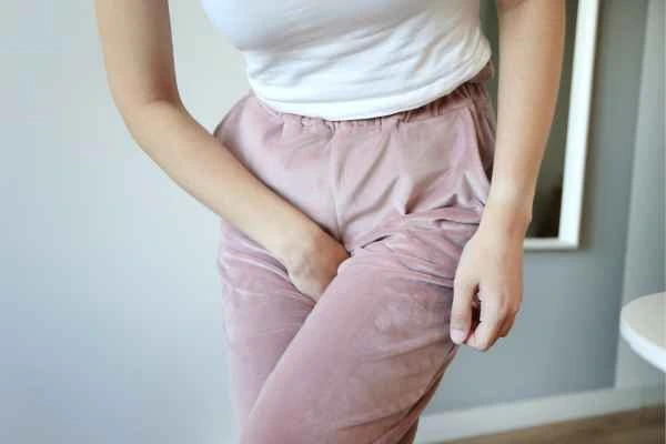 woman struggling with urine incontinence Chandlers Green
